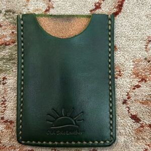 Green leather card sleeve, brand new